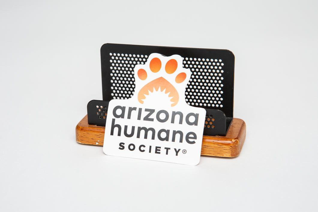 While die cut sticker with orange and black Arizona Humane Society logo